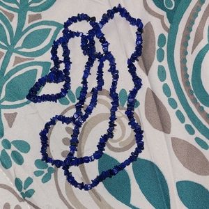 Strand of Lapis lazuli chips for jewelry making.